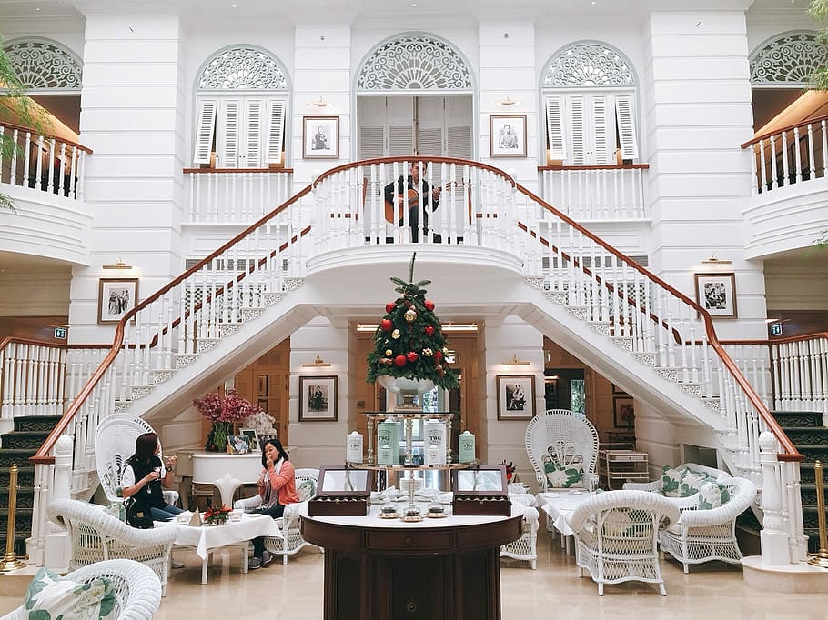 photo of house interior with two women sitting on chairs, photography of two women sitting on chair in living room HD wallpaper