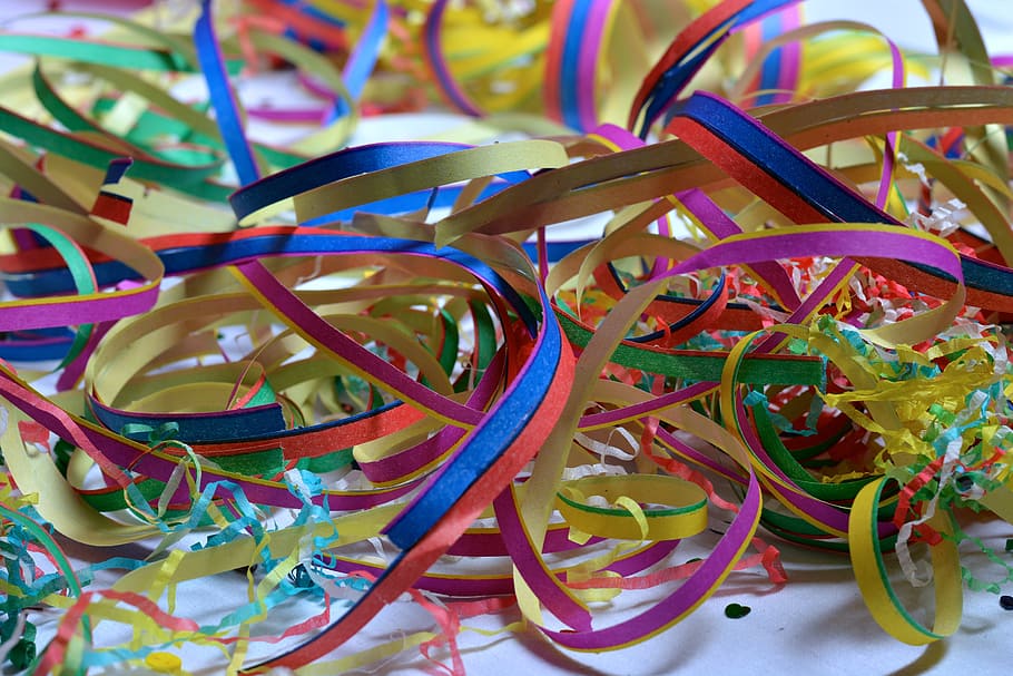 red, blue, and yellow confetti, carnival, multi colored, still life HD wallpaper