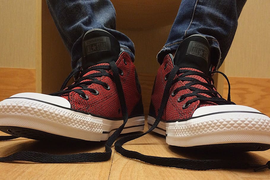 person wearing untied red-and-black Converse All-Star high-tops, HD wallpaper