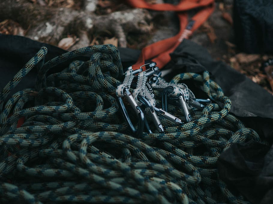 gray safety harness on focus photo, orange and grey rope harness