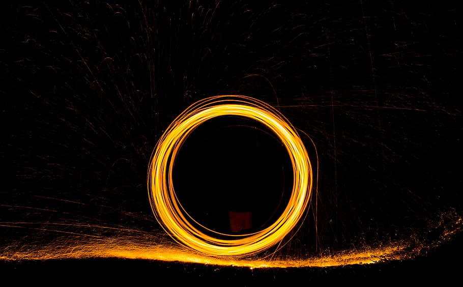 steel wool photography during nighttime, time lapse photography of fire