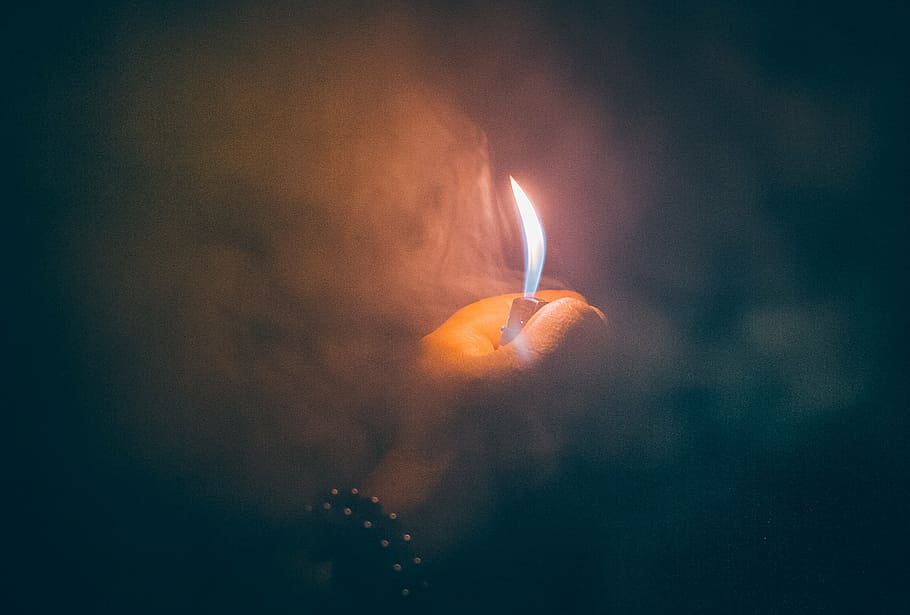 photography of person lighting up a lighter, blur, bright, dark HD wallpaper