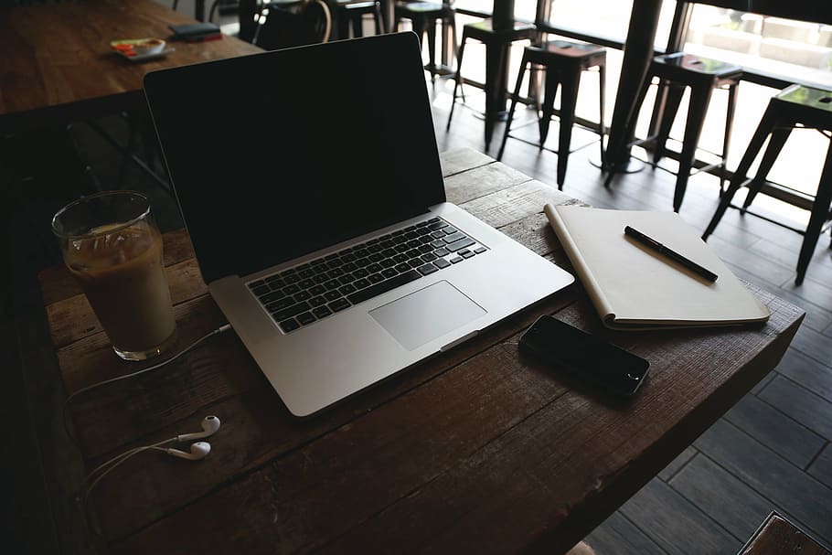 turned off silver MacBook on table, pro, brown, wooden, surface HD wallpaper