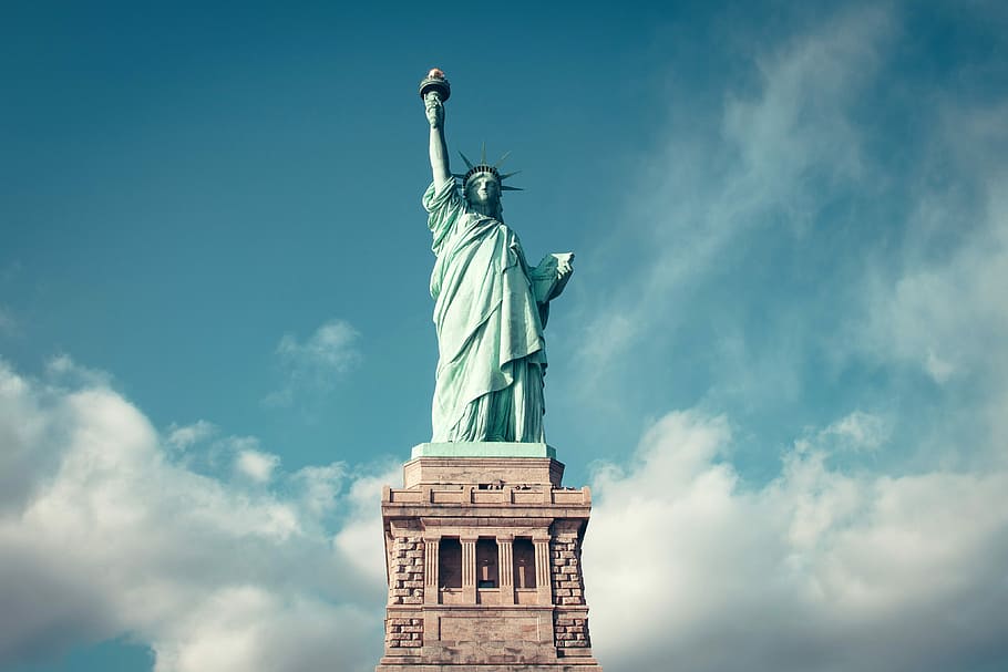 Frontal view of the Statue of Liberty, New York City, clouds HD wallpaper
