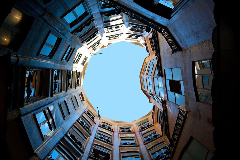 Wide-angle shot taken of Gaudi’s architectural masterpiece, Casa Mila. Image captured in Barcelona, Spain HD wallpaper