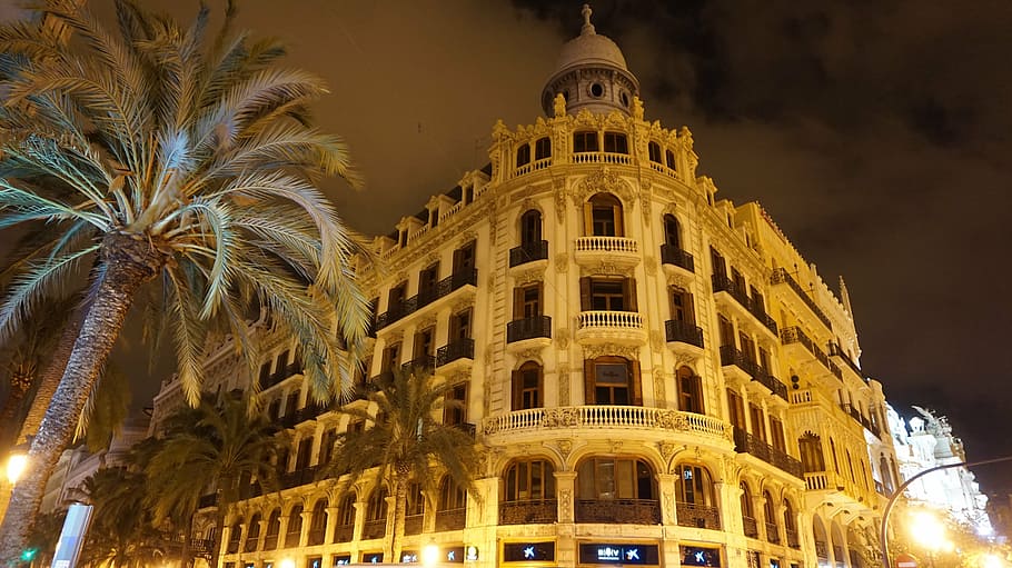 brown concrete building under gray sky during nighttime, spain, HD wallpaper