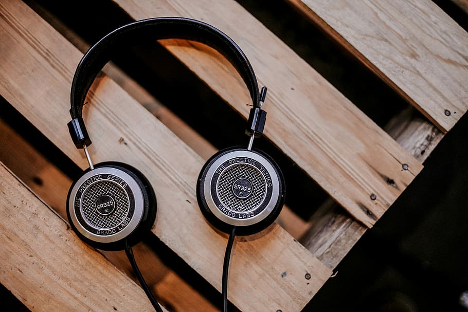 gray and black corded headphones on top of brown wooden surface, black headphones on brown pallet HD wallpaper