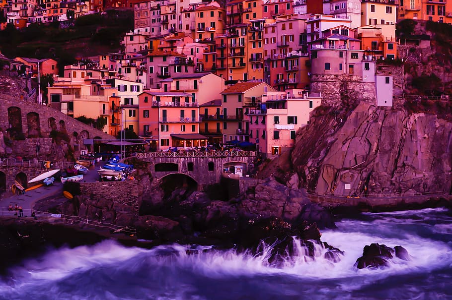 Manorola, Italy, ocean wave rushing to rock riprap Santorini, Greece, HD wallpaper