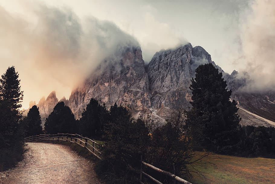 landscape photography of gray mountain, building covered in fogs HD wallpaper