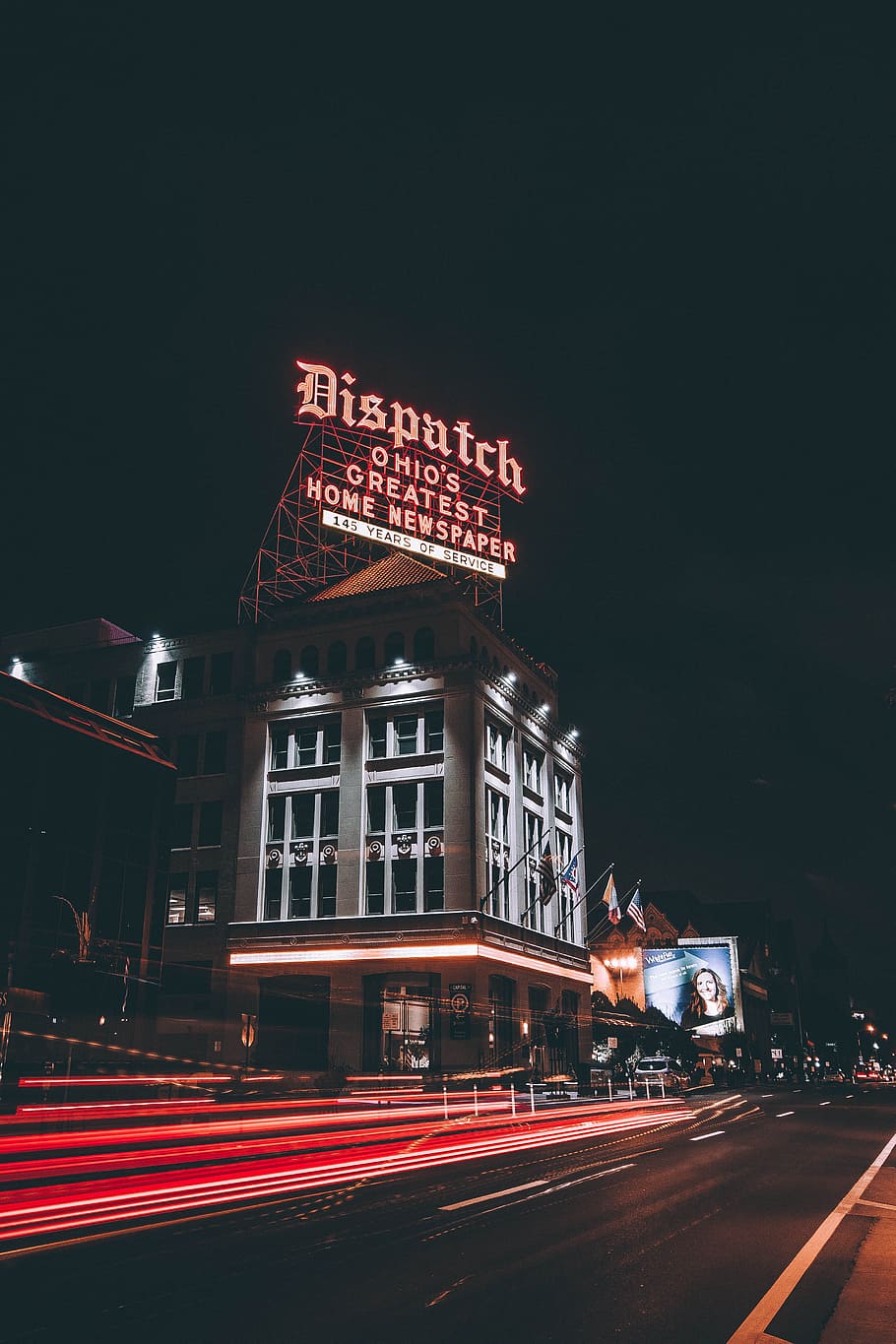 time-lapse photo of vehicles beside Dispatch Ohio's Greatest Home Newspaper building, Dispatch neon signage on top of building HD wallpaper