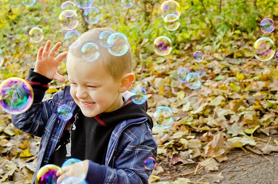 boy in plaid zip-up jacket playing bubbles, fun, colors, game HD wallpaper