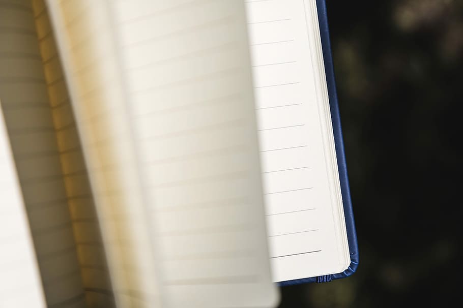 open page notebook, opened black lined notebook, calendar, paper HD wallpaper