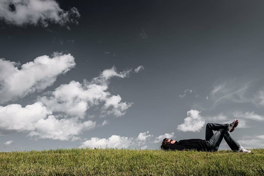 man lying on green grass field under cloudy sky, agriculture, HD wallpaper