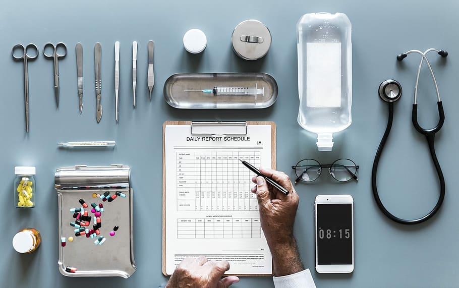 A notebook with a stethoscope on top of it next to a laptop photo – Free  Freetown Image on Unsplash