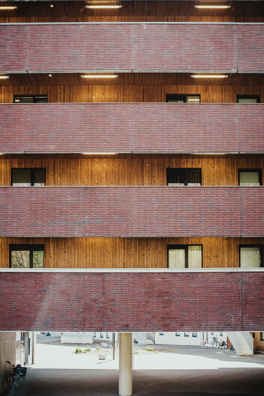 brown and maroon painted building, brown bricked building, facade HD wallpaper