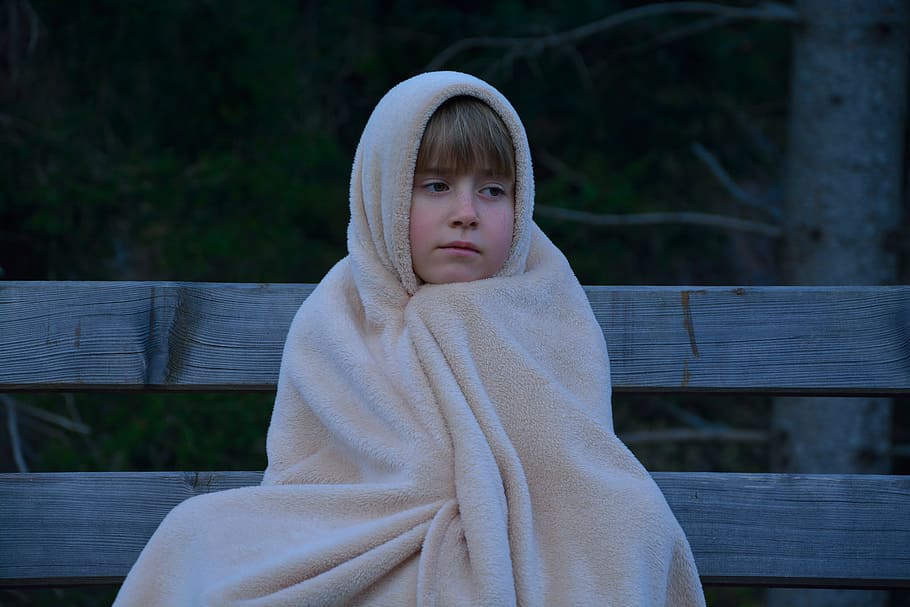 kid covered with blanket sitting on bench, child, girl, evening