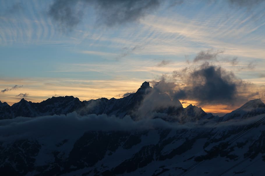 white clouds and mountain over golden hour view, landscape photo of mountains HD wallpaper
