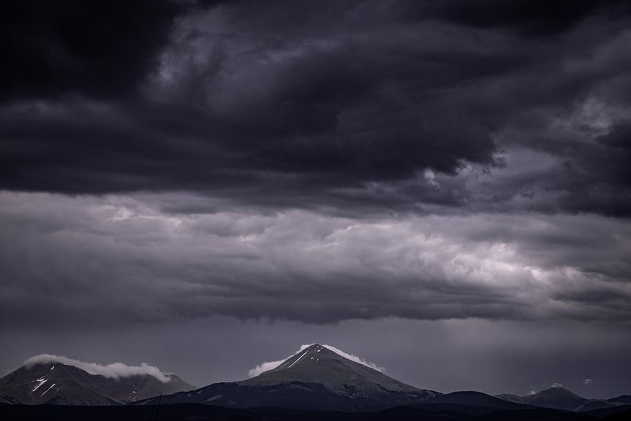 cloud formation above mountains, mountains under cloudy sky, dark HD wallpaper