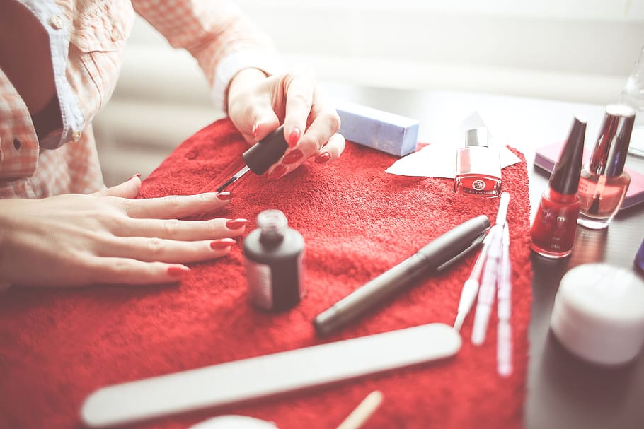 person's red nail polish on top of red textile, nails, makeup HD wallpaper