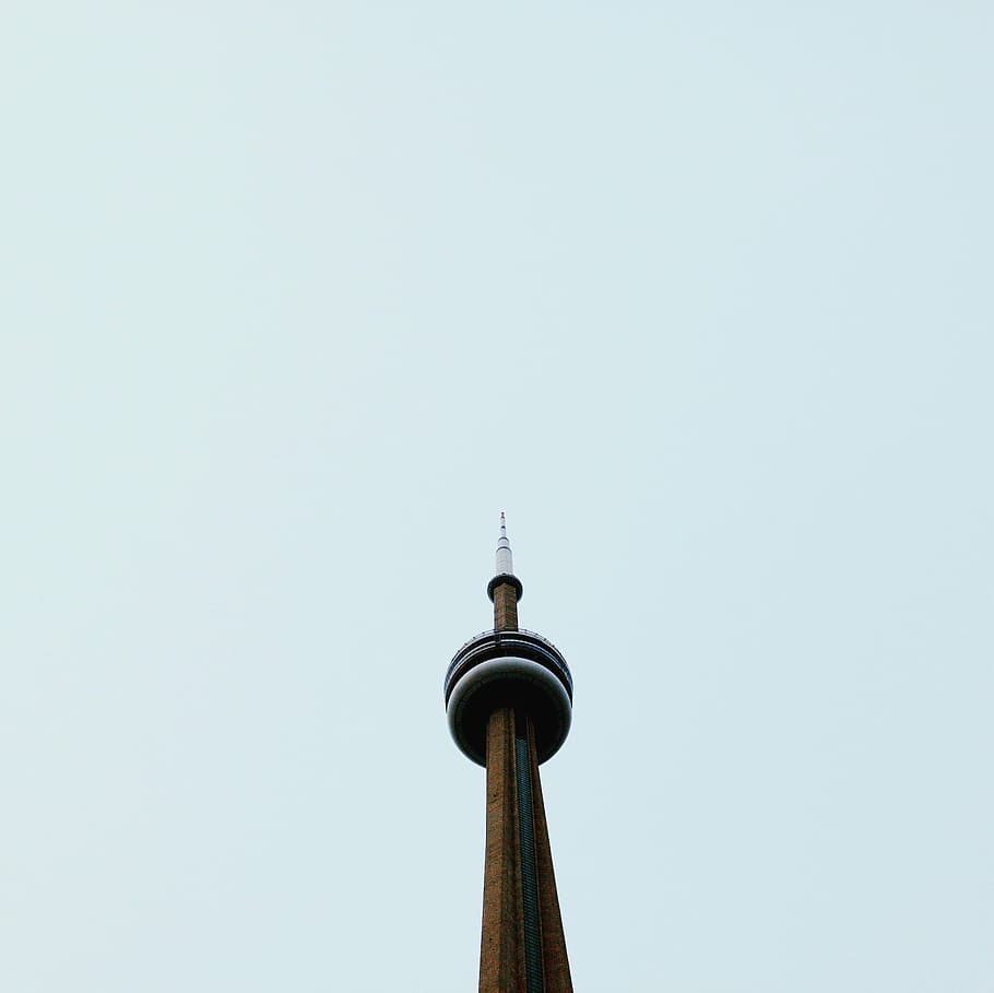 low angle photography of CN tower under blue sky during daytime, low-angle photo of brown and white tower HD wallpaper