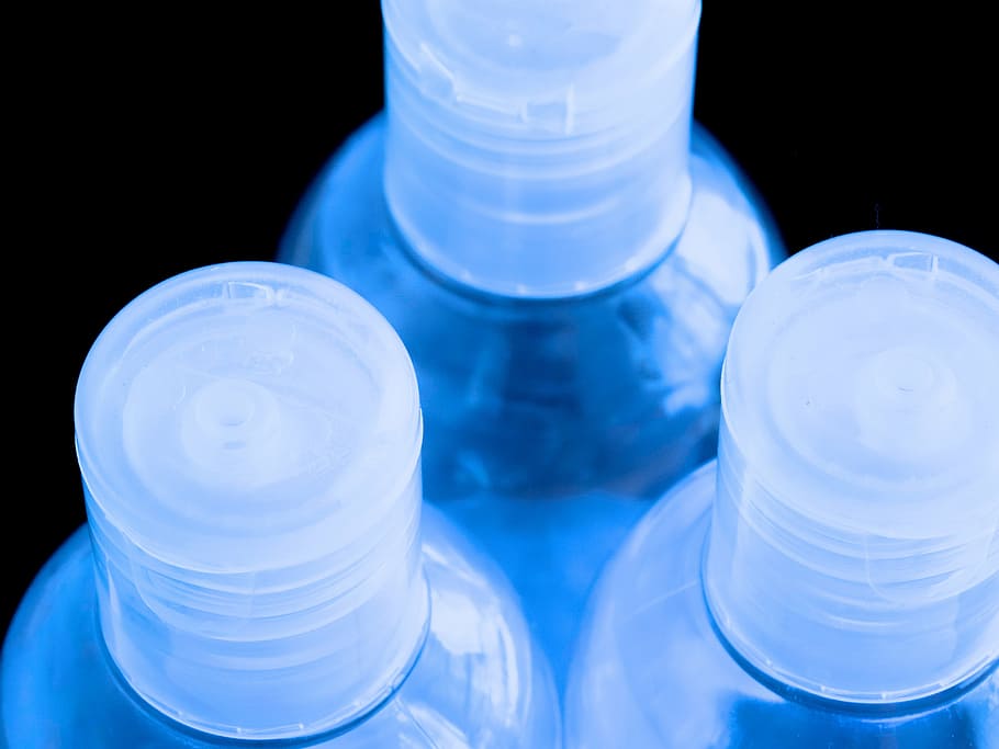 plastic, bottles, transparent, light blue, liquid, close-up HD wallpaper