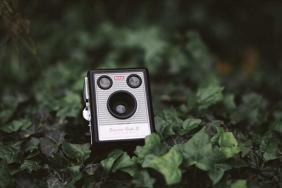 grey and black Coleman device, photo of black and gray camera on ground HD wallpaper