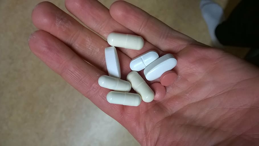 white capsules on hand, pills, tablets, drug, pharmacy, nutrient additives, HD wallpaper