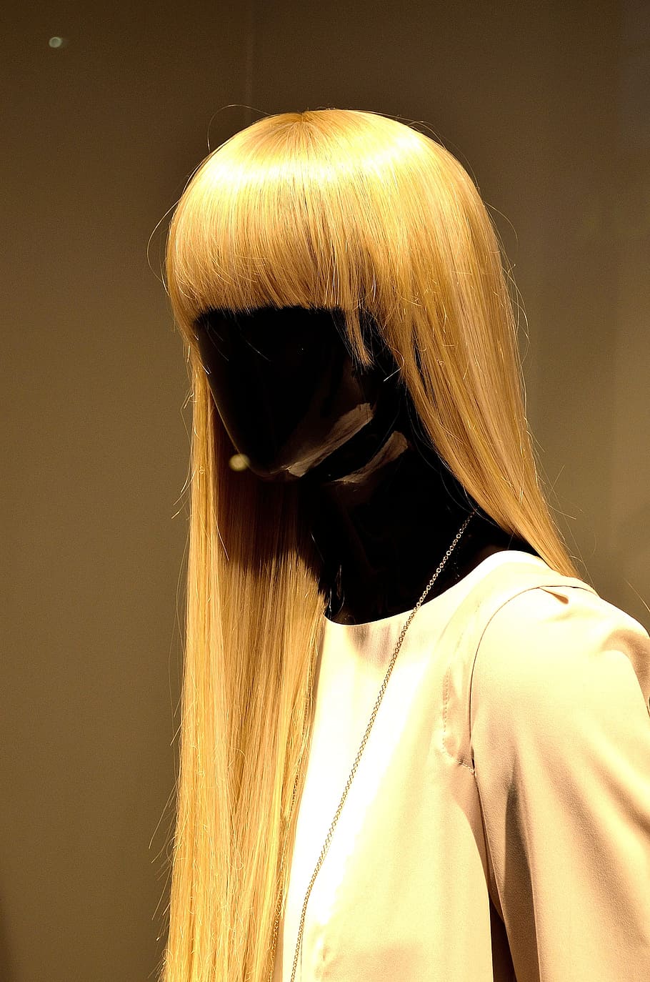 long blonde wig displayed on black mannequin, Woman, Figurine