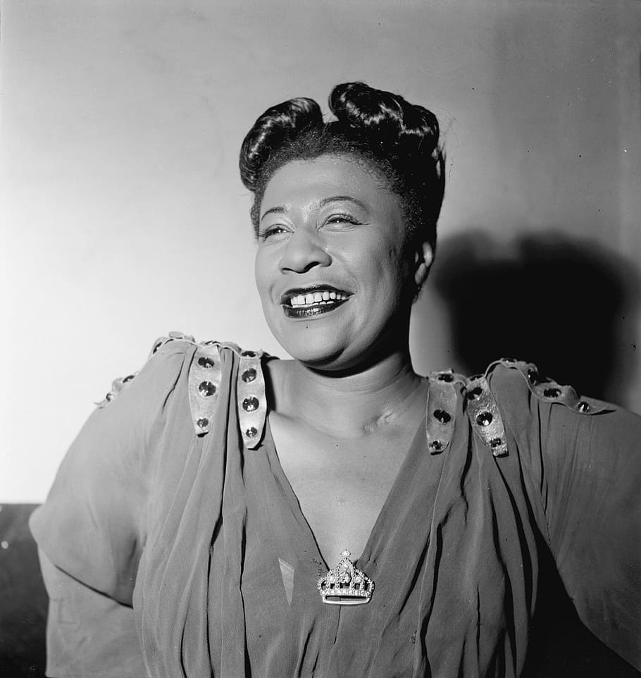 grayscale photography of woman in v-neck top near wall, ella fitzgerald