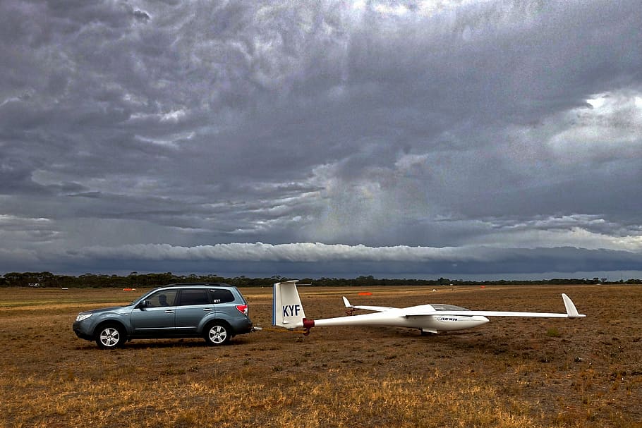 glider, storm, ominous, aero, soarer, open-air, sky, clouds HD wallpaper