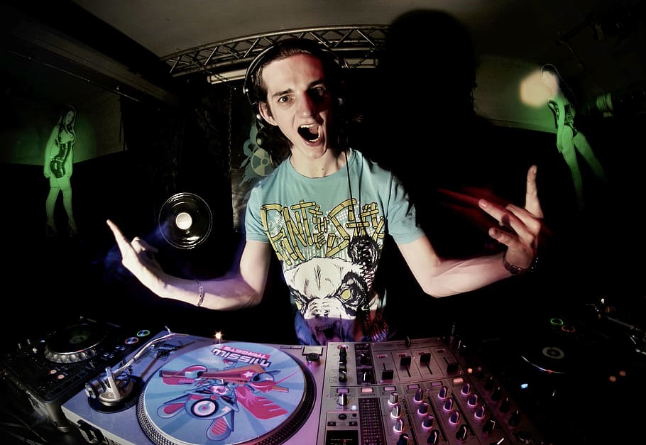 man standing beside DJ controller, gramophone, party, shout HD wallpaper
