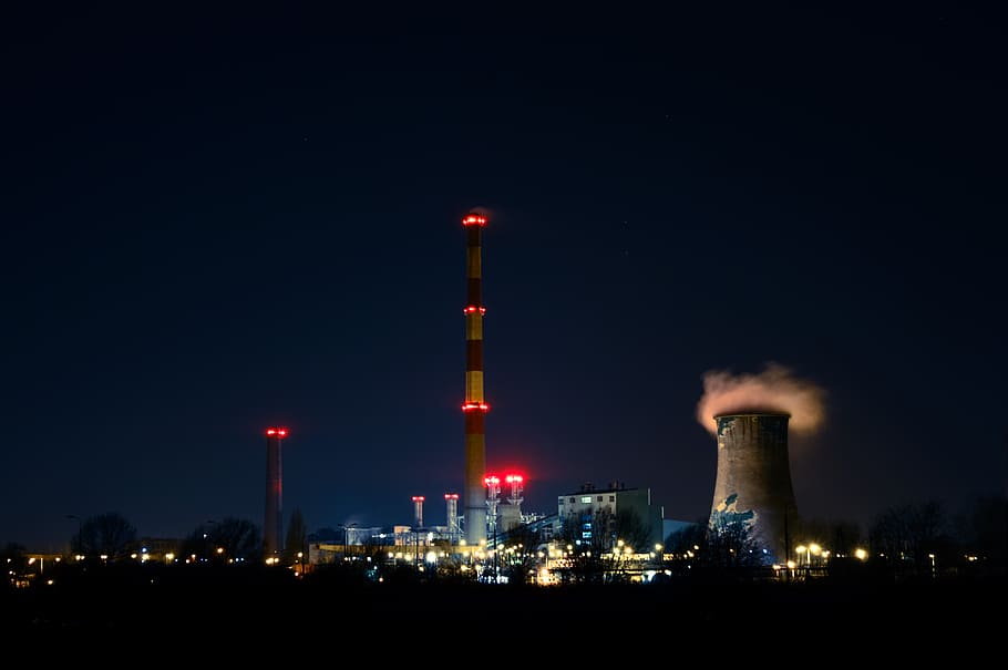 landscape photography of lighted high-rise building, power plant