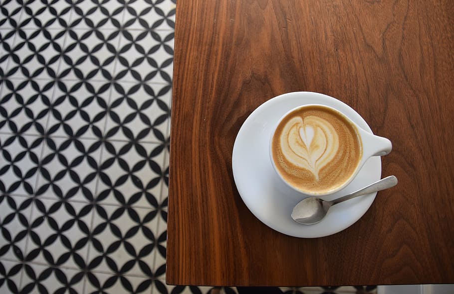cappuccino filled teacup with saucer on top of table, coffee HD wallpaper
