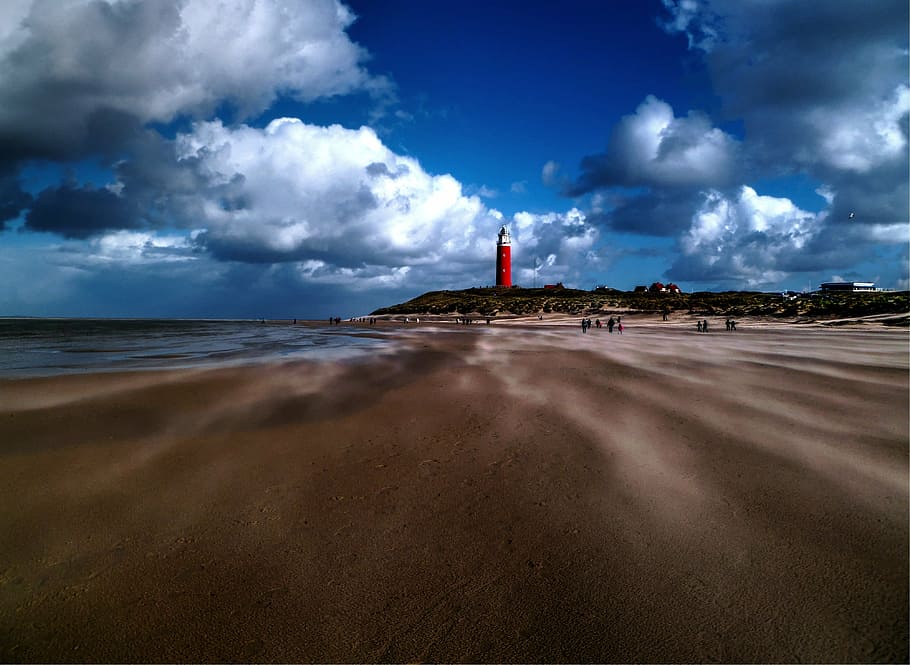 lighthouse, beach, sand, water, ocean, sea, people, clouds HD wallpaper
