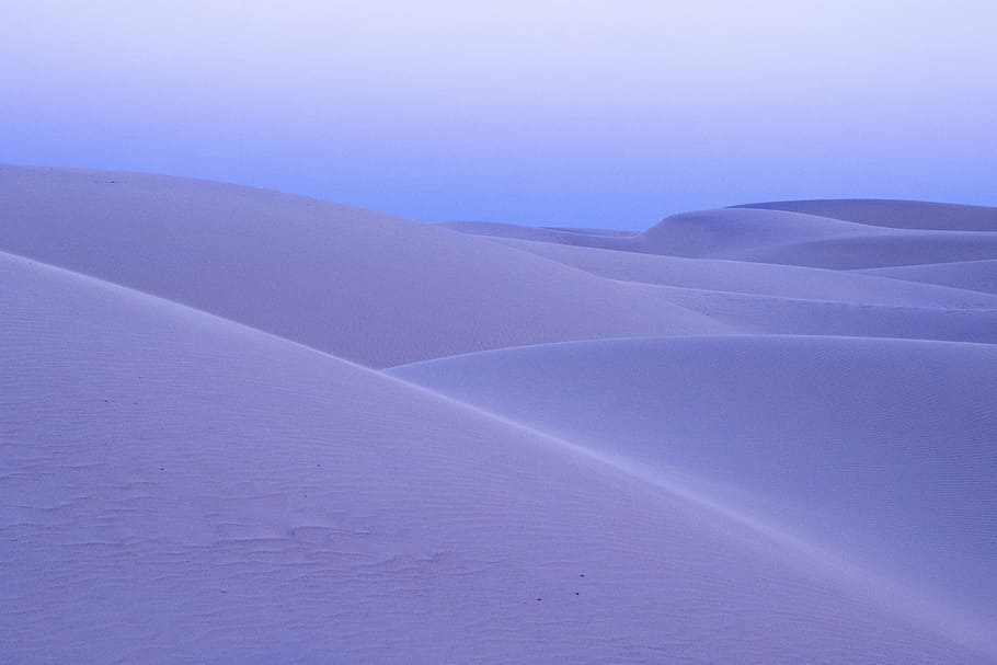 landscape photography of empty deset, dessert under white sky at daytime HD wallpaper