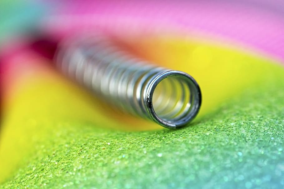 gray metal spring on yellow and green textile, gray coil spring HD wallpaper