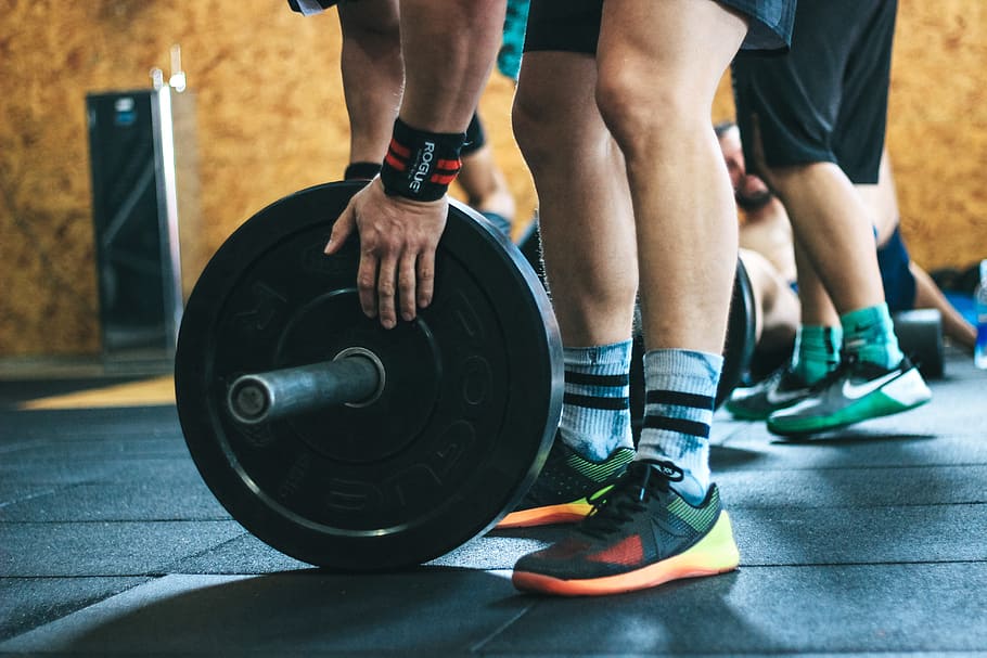 Person Holding Black Weight Plates, active, athlete, barbell