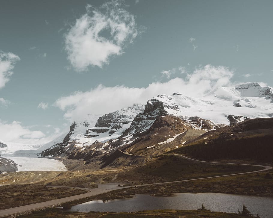 mountain touching the clouds, high raised of mountain alps, Athabasca Glacier HD wallpaper