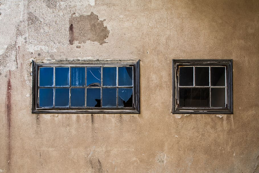 glass window on wall, broken windows, abandoned factory, empty