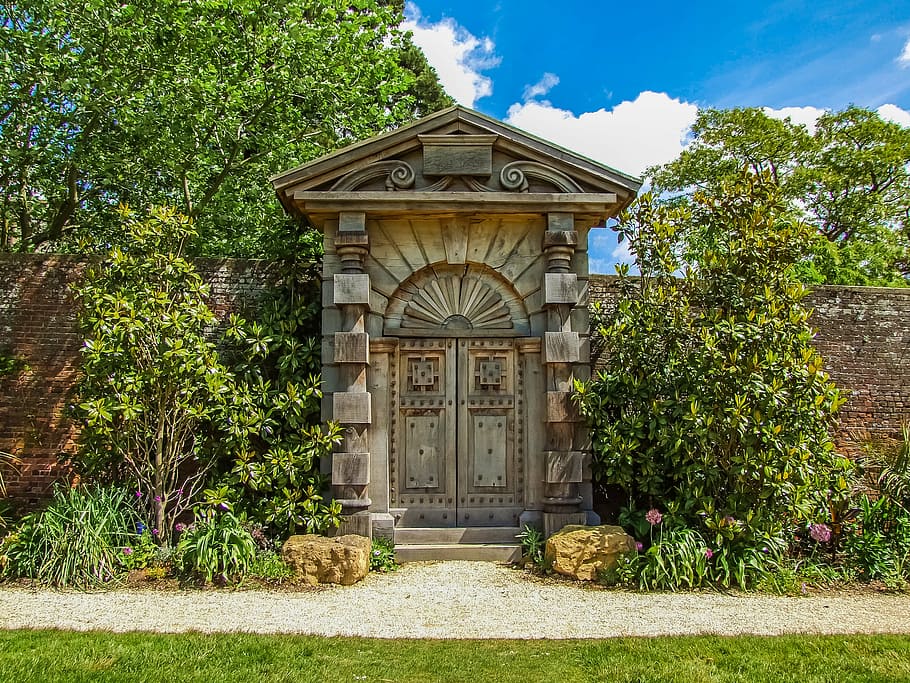 brown wooden door with red bricked wall, arundel castle, garden HD wallpaper