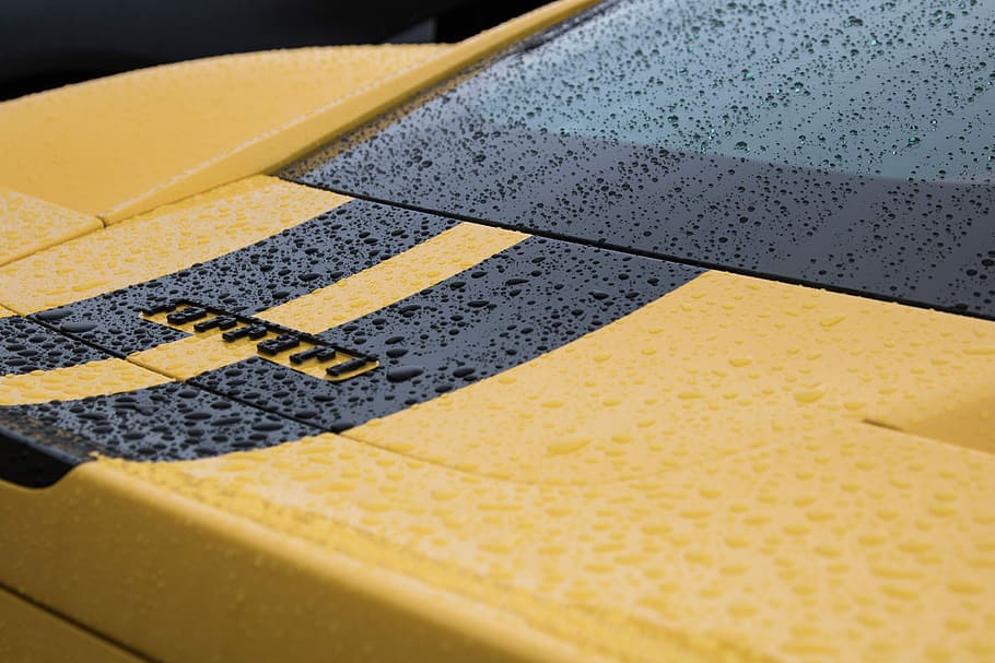 yellow Ferrari vehicle, car, rain, stripe, black, wet, water HD wallpaper