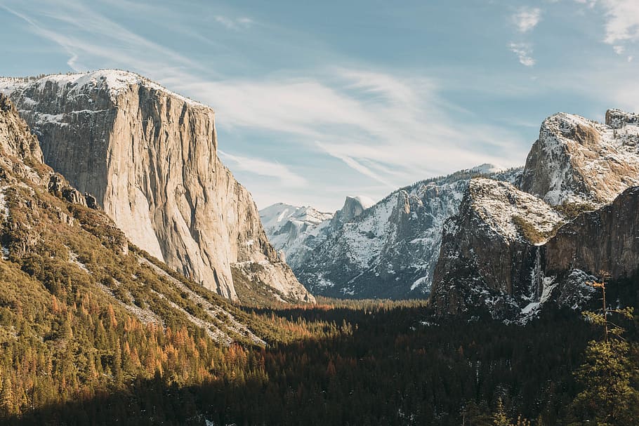 El Capitan, Yosemite at daytime, mountain covered with snow under cloudy sky HD wallpaper