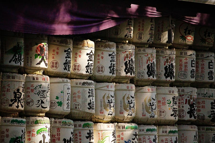 pile of beige container with kanji script printed, brown Kanji text-printed box lot HD wallpaper