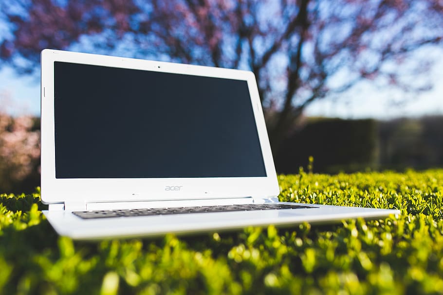 white Acer laptop on grass field, office, work, sunny, after work HD wallpaper