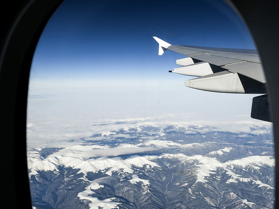 aerial view of airplane cockpit, airplane above mountain at daytime HD wallpaper