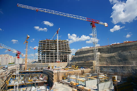 construction site under blue sky, building, crane, workers HD wallpaper