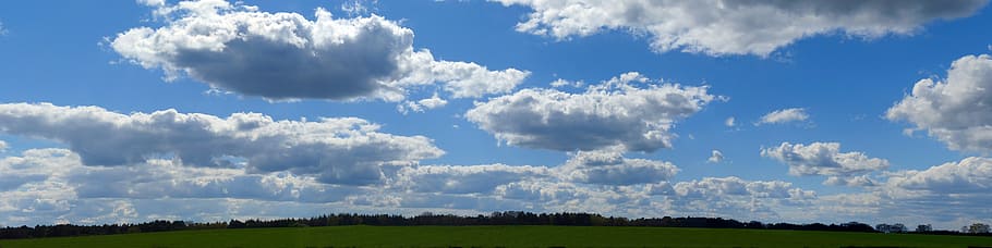 panorama photo of green loan under cloudy sky during daytime HD wallpaper
