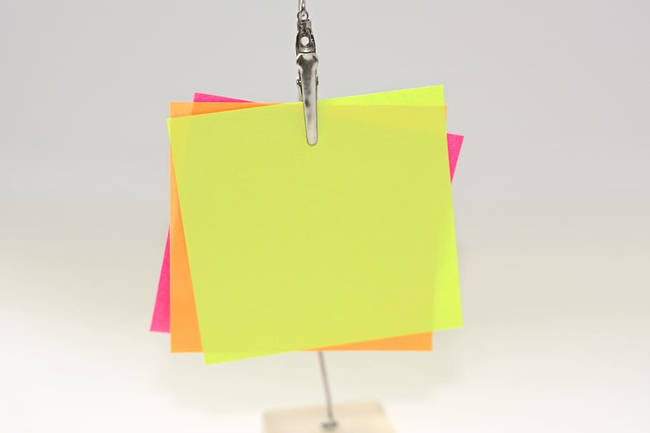 three assorted-color papers on metal clip, sticky notes, messages HD wallpaper