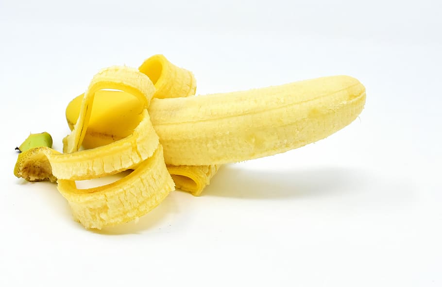 photo of peeled banana on white surface, delicious, fruit, eat