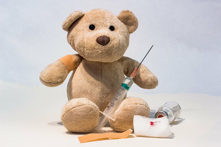 brown bear plush toy, syringe, disposable syringe, needle, hypodermic syringe